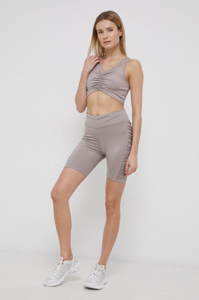 Шорти для тренувань Reebok H56373 жіночі колір жовтий однотонні висока посадка